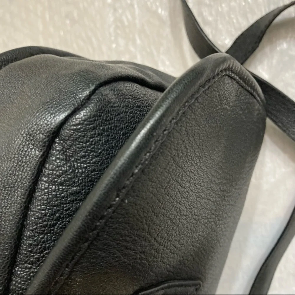 Michael kors black leather buckled saddle flap bag